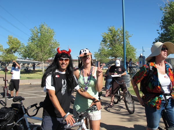 Photo is of Tauru and Christi.  Christi is wearing a hat in the shape of the Disney character, Goofy. 